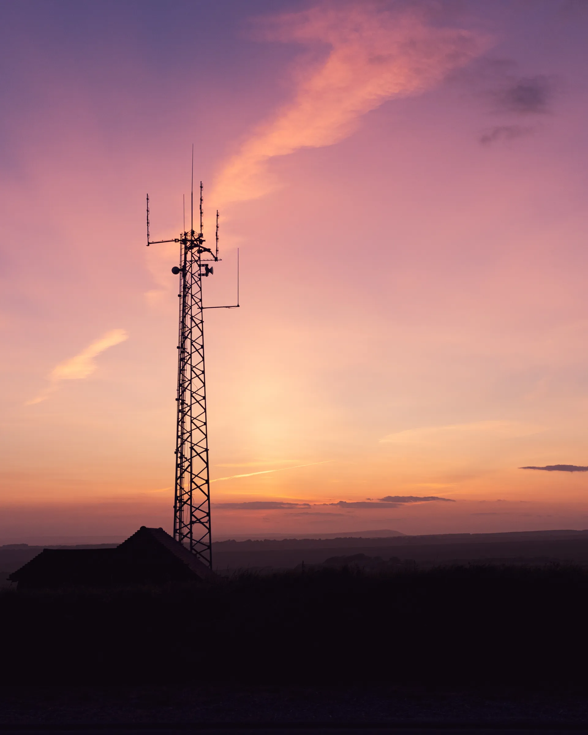 telecom antenna sunset